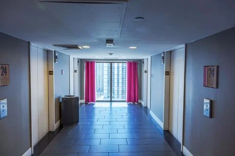 Beautiful view of modern hotel elevator lobby on 24th floor with large window Stock Photos