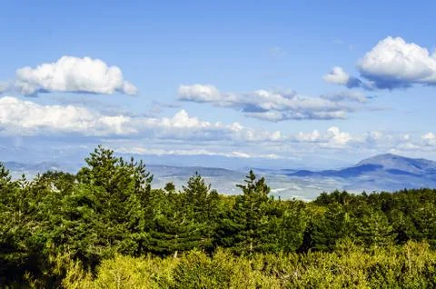 Beautiful view from the mountain, with impressive cloudscape and environment. Stock Photos