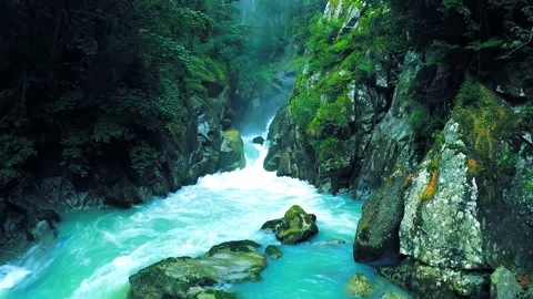 Beautiful view of the mountain river and the waterfall in the canyon	 Stock Footage 149322006