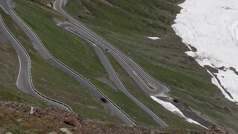 Beautiful view of mountain road to Stelvio pass in Italian Alps. Stock Footage 124670053
