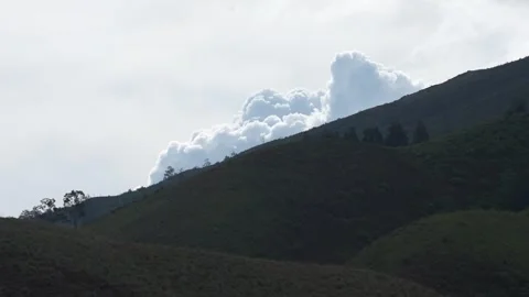 Beautiful view of the mountain slopes with clouds behind Stock Footage 258313869