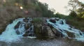 Beautiful view of mountain waterfall, water running down rocks HD Footage