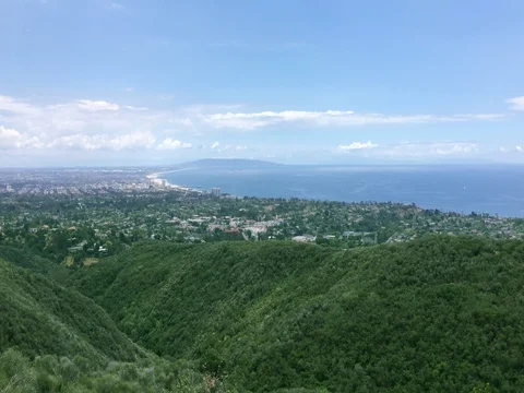 Beautiful view of mountains and ocean from top Stock Footage 77700531