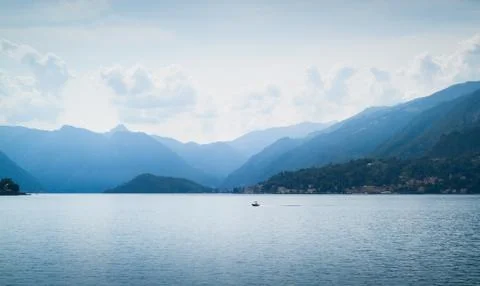 Beautiful view of mountains disappearing into the distance at Lake Como in It Stock Photos
