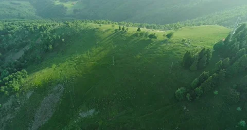 Beautiful view of the mountains from the drone. Flying drone over forest and a Stock-Footage 164897199