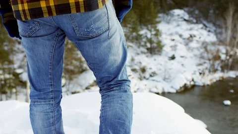 A beautiful view of the mountains in winter. A Young Man is Walking Up Mountain Stock Footage 101028846