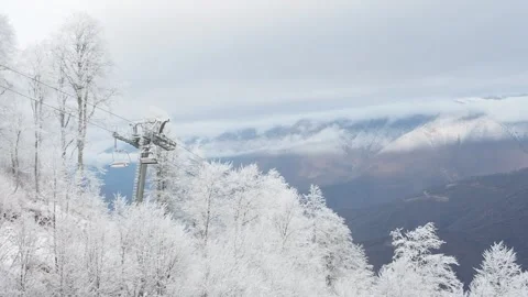 Beautiful view from the moving cabin of the ski lift at the ski resort Stock Footage 260468013