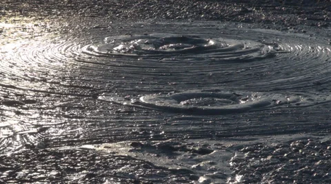 Beautiful view mud volcano eruption bubble gas water reflection sunset sunlight Stock Footage