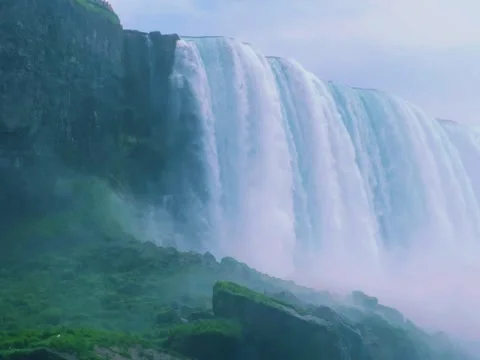 Beautiful View of Niagara Falls From Canada Side, River cascading over the .. Stock Footage 256574228
