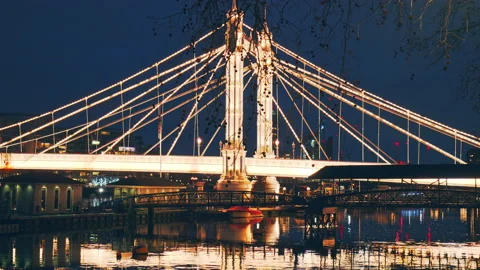 Beautiful view at night of Albert Bridge in Battersea, London, UK in 8K. Stock Footage 147322932