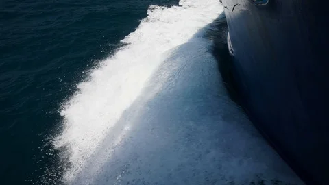 Beautiful view from the nose of a floating high-speed ship cutting water and sea Stock Footage 89348505