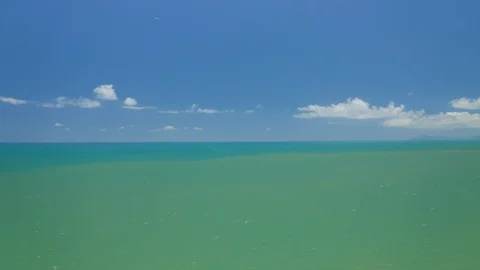 Beautiful view on the ocean and the plane flying above it in Australia Stock Footage 108390031