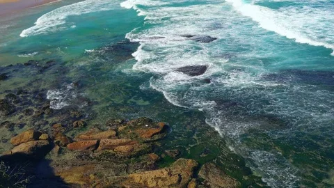 Beautiful view of the ocean beach with the rocks. Video stock 80581250