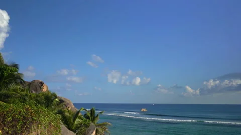Beautiful view of the ocean with clouds with a boat floating in the distance Video stock 111362342