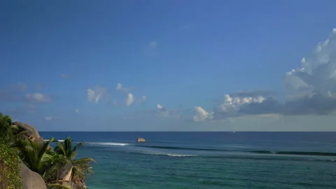 Beautiful view of the ocean with clouds with a boat floating in the distance Video stock 111362427