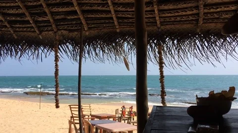 Beautiful view of the ocean waves and the beach from the beach cafe Sri Lanka Stock Footage 71610147