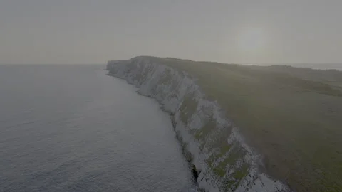A beautiful view of the ocean with a white cliff in the background Video stock 298275879