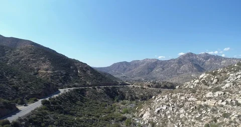 Beautiful view over Pine Valley winding mountain road California drone aerial 4K Stock Footage 111308110