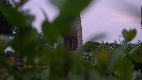 Beautiful View Of Parvati Temple Behind Plants Situated At The Western Vídeo Stock 221008962