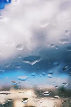 Beautiful view of raindrops on a window surface Stock Photos