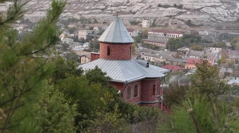 Beautiful view of red brick big house with tin-plate roof. Stock Footage 42653673