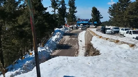 Beautiful view of a Road Between Snow, Islamabad, 28/02/2024. Stock Footage 265680363