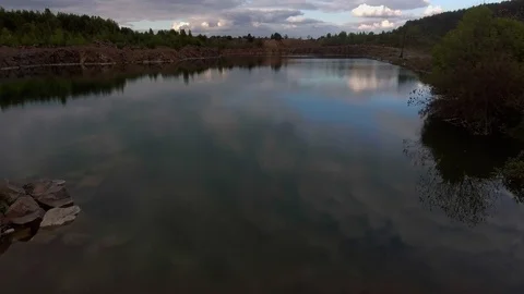Beautiful view from a road going through the beautiful lake and forest Stock Footage 91000068
