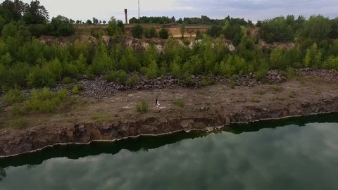 Beautiful view from a road going through the beautiful lake and forest Stock Footage 91700051