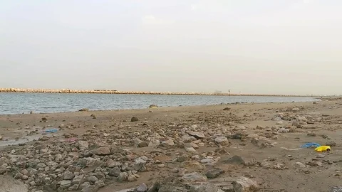 Beautiful view of rock inside seawater at a beach Stock Footage 126996434