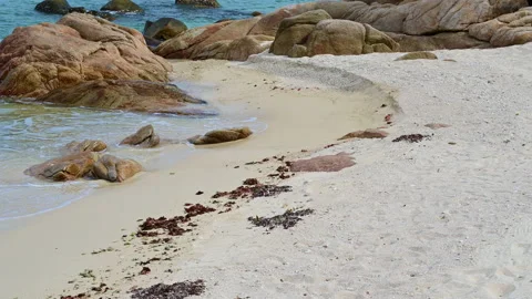 Beautiful view of rocks beach with blue ocean wave. Stock-Footage 156990559