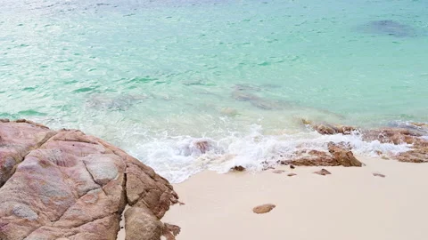 Beautiful view of rocks beach with blue ocean wave. Stock-Footage 157058730