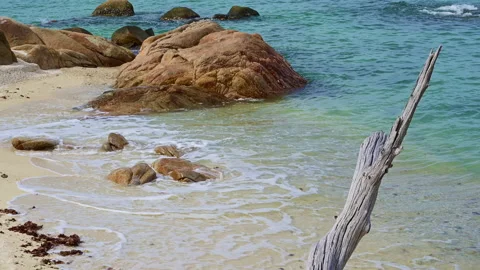 Beautiful view of rocks beach with blue ocean wave. Stock-Footage 158346323
