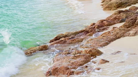 Beautiful view of rocks beach with blue ocean wave. Stock Footage 159200862