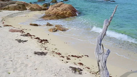 Beautiful view of rocks beach with blue ocean wave. Stock Footage 159265117