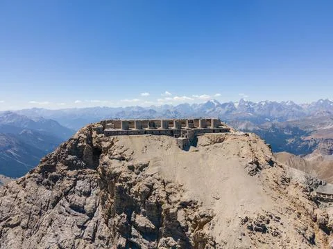 Beautiful view of ruined artillery batteries with people in Mont Chaberton peak Stock Photos