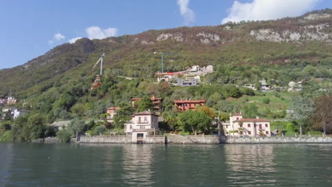 Beautiful view of Sala Comacina town from ferry boat. Stock Footage 255885843