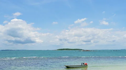 Beautiful view of sand beach and ocean wave with blue sky and cloud. Stock Footage 159267101