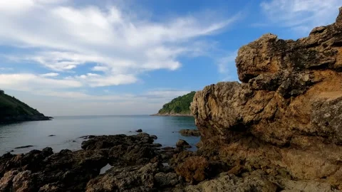 Beautiful view of the sea and clouds from the rocky shore. Stock Footage 230079376