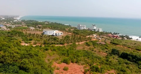 A beautiful view of sea side building at the cape coast of Ghana, Push In Vidéo 125546777