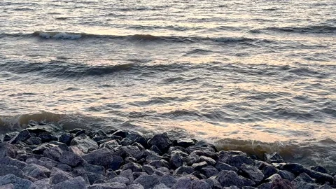 Beautiful view the sea waves in windy weather. Waves crashing against rocks.. Stock Footage 317375404
