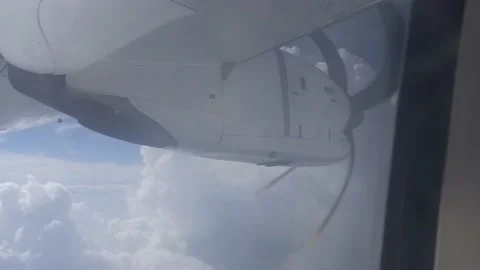 A beautiful view of sky and one engine of a ATR flight Stock Footage 217685376