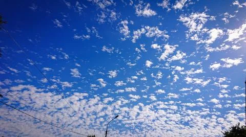 Beautiful view of the sky with light clouds in the city Stock Photos