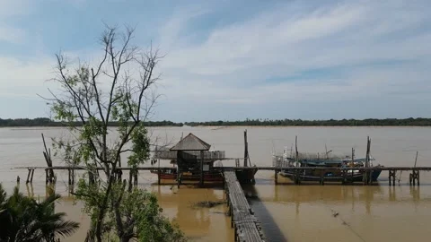Beautiful view of small Jetty Kuala Pahang with clear sky Stock Footage 147344662