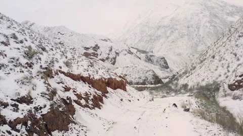 Beautiful view of the snow-covered red mountain canyon Konorchek Video stock 269097408