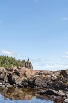 A beautiful view of Split Rock Lighthouse on the rocky coast of Lake Superior. Stock Photos