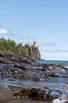 A beautiful view of Split Rock Lighthouse on the rocky coast of Lake Superior. Stock Photos