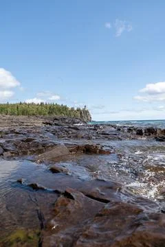 A beautiful view of Split Rock Lighthouse on the rocky coast of Lake Superior. Stock Photos