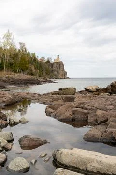 A beautiful view of Split Rock Lighthouse on the rocky coast of Lake Superior. Stock Photos
