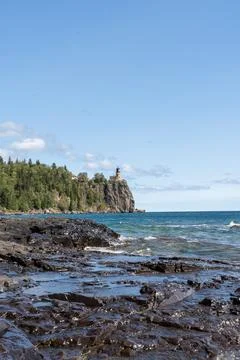 A beautiful view of Split Rock Lighthouse on the rocky coast of Lake Superior. Stock Photos
