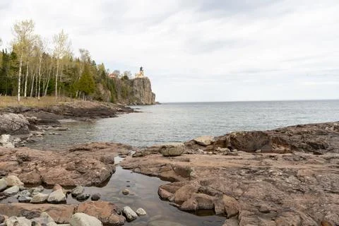 A beautiful view of Split Rock Lighthouse on the rocky coast of Lake Superior. Stock Photos